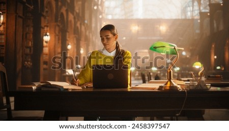 Similar – Image, Stock Photo Young female student in a university library