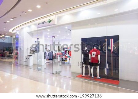BANGKOK - MAY 29:  Lacoste Store at Central Rama 9, Bangkok on May 29, 2014.  Lacoste is a French apparel company that sells high-end clothing, most famously tennis shirts.