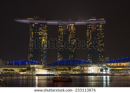 SINGAPORE - OCT 18 : Nightscape of Singapore Marina Bay Sand on Oct 18, 2014, Singapore. Marina Bay Sands is billed as the world\'s most expensive standalone casino property at S$8 billion.