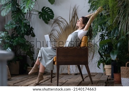 Similar – Image, Stock Photo Young woman resting during training after jogging