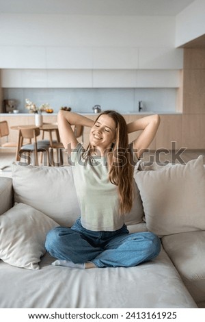 Similar – Image, Stock Photo Dreamy woman raising leg while standing near fence