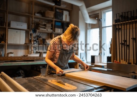 Image, Stock Photo Saws details of furniture with a circular saw. circular saw for cutting wood.