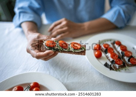 Similar – Image, Stock Photo Crop woman with slice of lemon