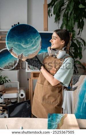 Similar – Image, Stock Photo Creative craftswoman painting picture in workshop