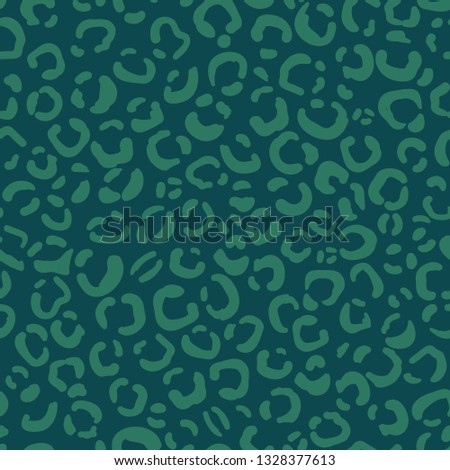 Vector green Leopard print skin seamless pattern background. Perfect for fabric, scrapbooking, wallpaper,stationary projects.