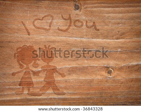 I love you writing in wood with love couple