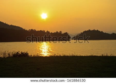 camping ground and sunset at lake Camping at kaeng krachan Dam, Phetchaburi, Thailand