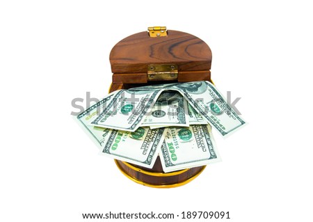 Money in wooden treasure box
