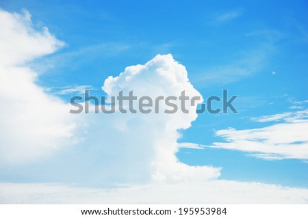 Cloudscape. Blue sky and white cloud. Sunny day (Sphinx figure)