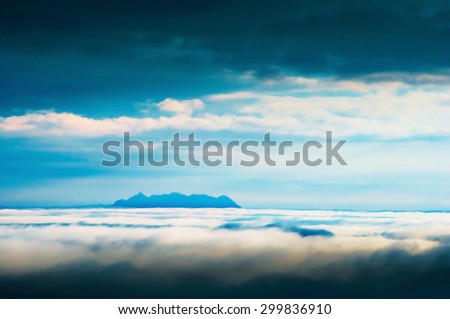 Overcast weather Mountain with mist landscape in blurred concept