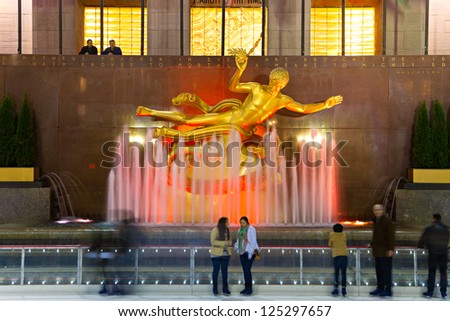 NEW YORK CITY - MARCH 31: The golden Prometheus statue at the Rockefeller center on March 31, 2012 in New York, NY. This bronze gilded statue is located at the front of 30 Rockefeller Plaza