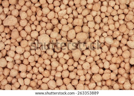 large mineral fertilizers granules abstract background