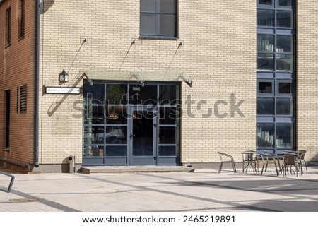 Similar – Image, Stock Photo Brick facade with window and unicorn balloon