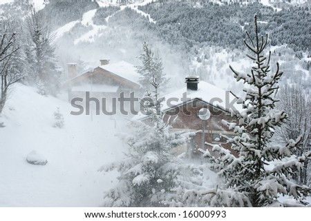 Ski resort at snow storm, Meribel, Trois Vallees, France