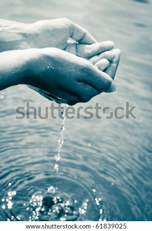 Water Pouring Out Of A Young Woman'S Hands Stock Photo 61839025 ...