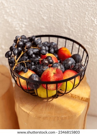 Similar – Foto Bild Runde Obstschale mit Banane, Pfirsich und Avocado auf grauem Betonboden in einer Designerwohnung in Rudersau bei Rottenbuch im Kreis Weilheim-Schongau in Oberbayern