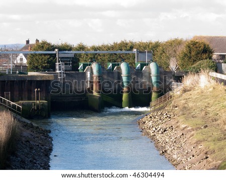 A water pumping station on a river in England