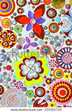 colorful paper flowers, zentangle like decorative circular floral elements, made of paper