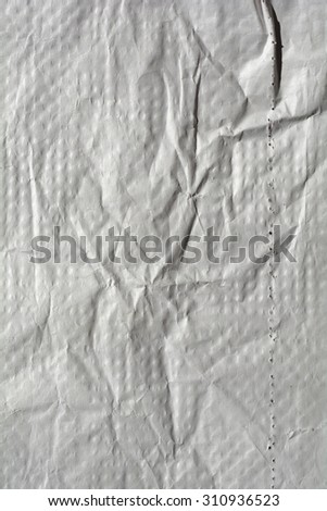 Paper textured. White and gray paper sheet with dots embossing. Crumple and wrinkle background.