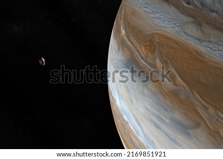 Satellite Amalthea, Jupiter V, orbiting around Jupiter planet. 3d rendering Stock fotó © 
