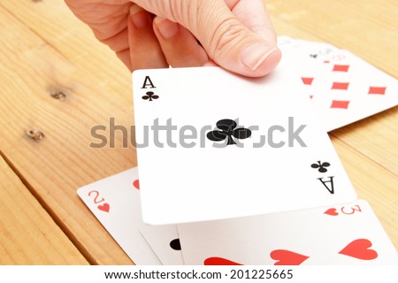 Poker card in hand
