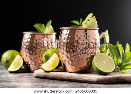 Similar – Image, Stock Photo Moscow Mule cocktail in copper mugs