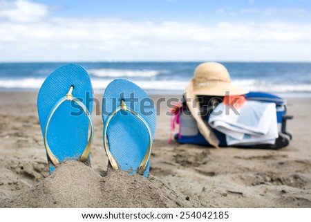 Summer shoes on sand