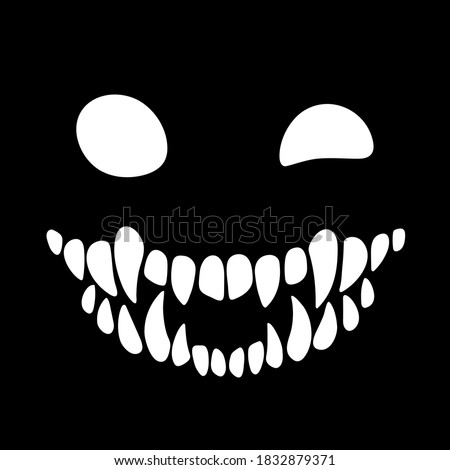 eyes and smile of a monster on a black background