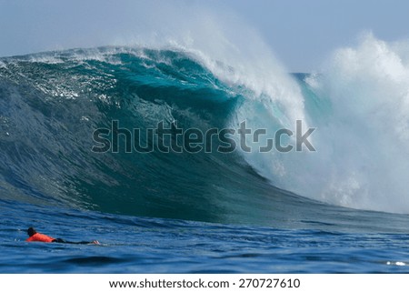 A beautiful blue wave crashes down at one of the world's premier big wave surfing spots, Dungeons in Cape Town, South Africa.