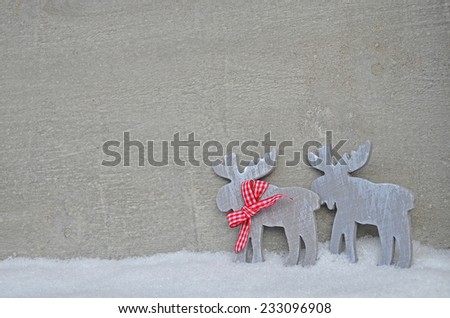 Two christmas elk whit snow, background
