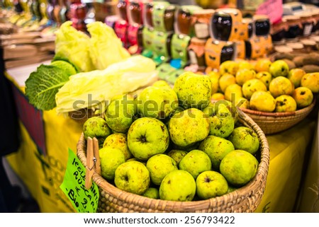 GENOA, ITALY - FEBRUARY 15, 2015: Brightly colored fruits and vegetables are displayed as part of the Cibio, the annual fair specialized on good quality italian food