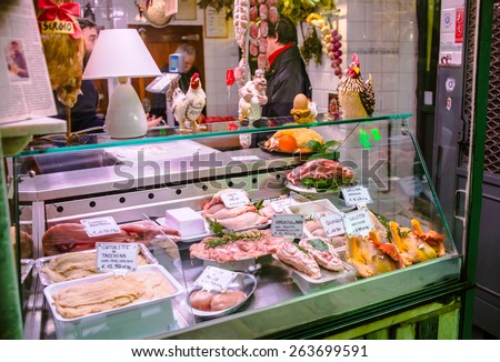 GENOA, ITALY - FEBRUARY 27, 2015: Store selling typical Italian gourmet delicacies and local specialties like cheese and meat