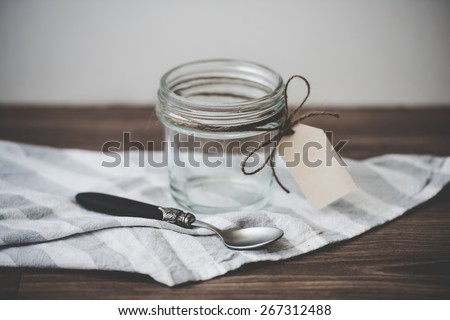 Empty jar with paper label. Blank label provides copy space for a message. Toned picture