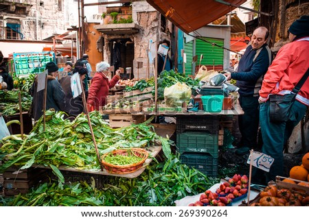 PALERMO, ITALY - MARCH 13, 2015:  Grocery shop at famous local market Ballaro in Palermo, Italy