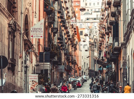 NAPLES, ITALY - MARCH 20, 2015: Classical romantic small street in the historical center of Naples, Italy. Naples is the the third-largest city in Italy with about 1 million residents