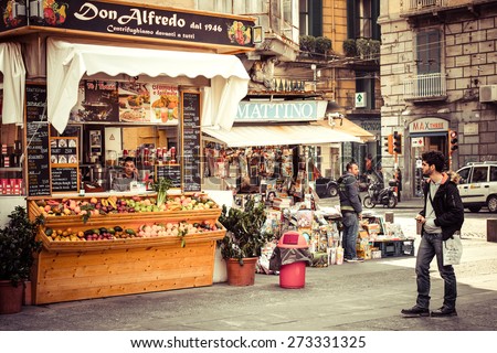 NAPLES, ITALY - MARCH 20, 2015: Small fast food cafe and shop in the historical center of Naples, Italy