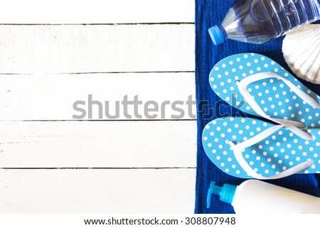 Summer accessories on the wooden Background./ Summer accessories on the wooden Background.