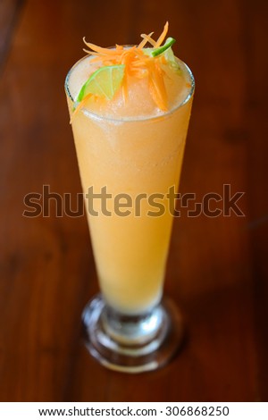 a healthy drink, carrot mixed lime juice blend