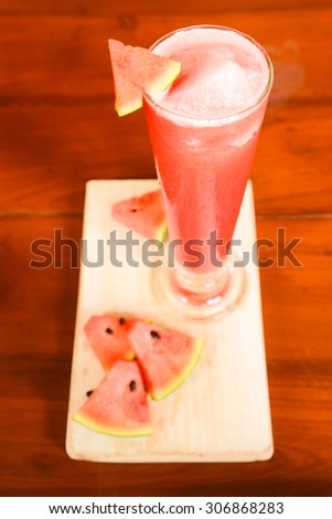 a glass of fresh watermelon shake