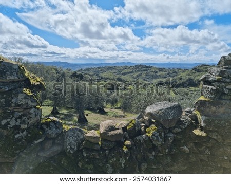 Similar – Foto Bild ein Gebirgszug, umrahmt von Vegetation an den Rändern, an einem Sommertag mit einem Himmel mit baumwollartigen Wolken, Pena Telera, Valle de Tena, Biescas, Huesca, Spanien