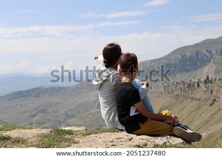 Similar – Image, Stock Photo Calm children enjoying amazing view of lake