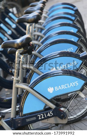 LONDON - SEPTEMBER 7: Row of hire bikes lined up in a docking station in London, a bicycle sharing system first introduced in London in July 2010, on September 7, 2012.