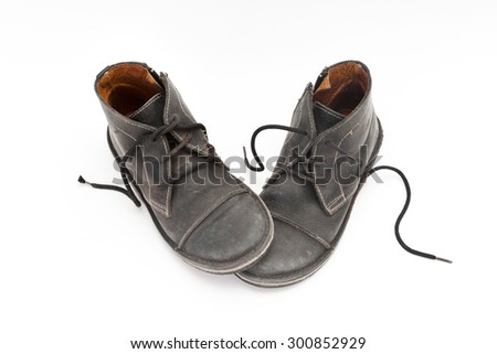 A pair of Old Black male shoes isolated on white