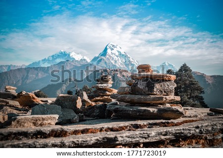 Similar – Image, Stock Photo Cairn rock formation along the trail to Annapurna Base Camp in Ghorepani Poon hill in Nepal