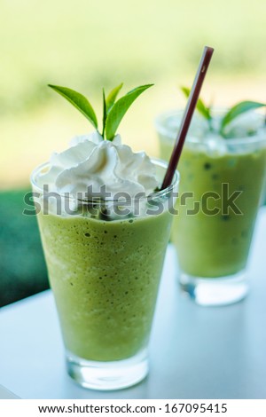 Cup of Green tea smoothies with fresh green tea