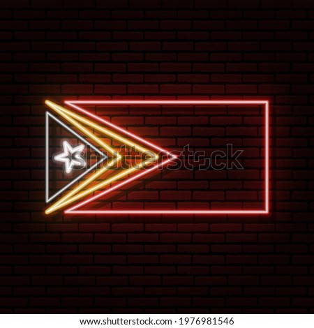 Neon sign in the form of the flag of East Timor. Against the background of a brick wall with a shadow. For the design of tourist or patriotic themes.