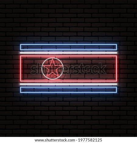 Neon sign in the form of the flag of North Korea. Against the background of a brick wall with a shadow. For the design of tourist or patriotic themes.