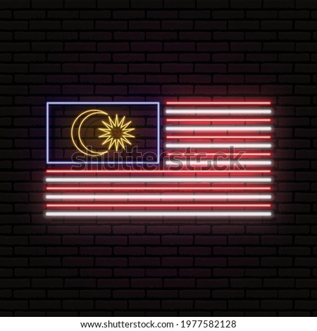 Neon sign in the form of the flag of Malaysia. Against the background of a brick wall with a shadow. For the design of tourist or patriotic themes.