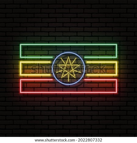 Neon sign in the form of the flag of Ethiopia. Against the background of a brick wall with a shadow. For the design of tourist or patriotic themes. The African continent