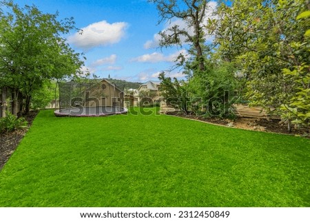 Similar – Image, Stock Photo Trampoline on a lawn in the sunset with two kids